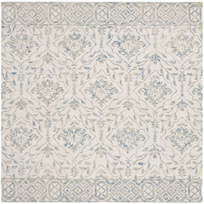 Tapis en laine Elvedina à motif floral, teint à la main par SAFAVIEH