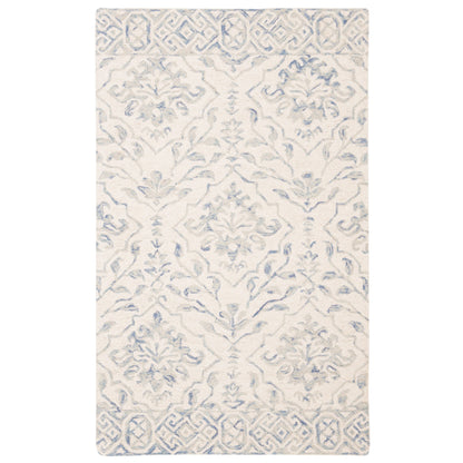 Tapis en laine Elvedina à motif floral, teint à la main par SAFAVIEH