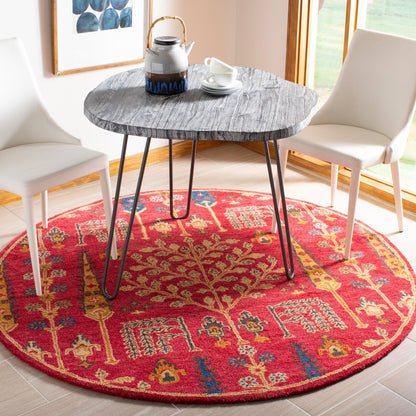 Tapis oriental traditionnel en laine SAFAVIEH fait main, motif floral, style classique.