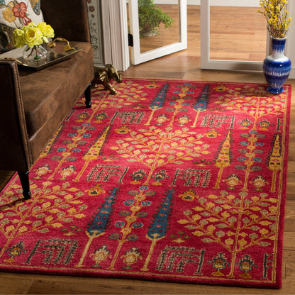 Tapis oriental traditionnel en laine SAFAVIEH fait main, motif floral, style classique.