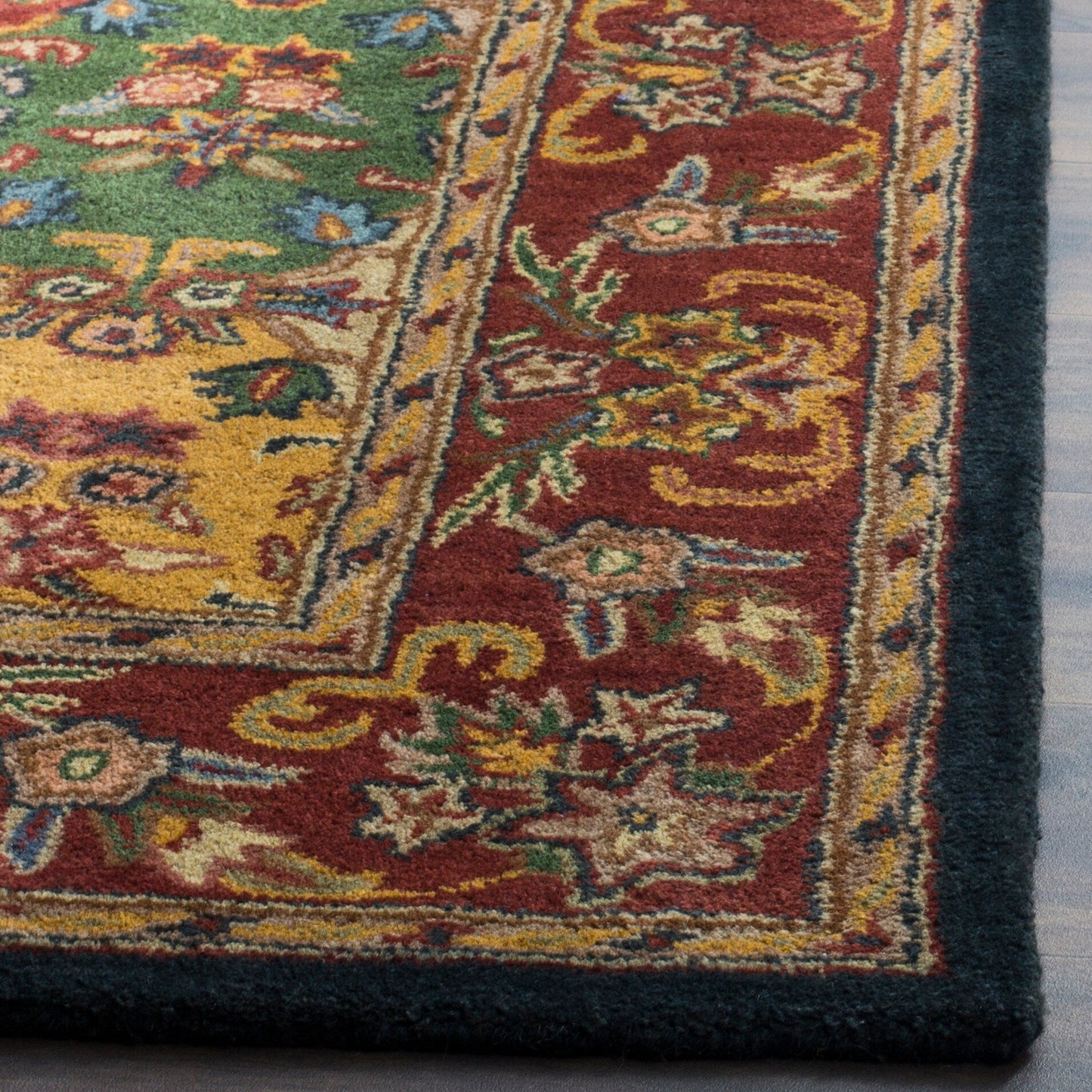 Tapis oriental traditionnel en laine SAFAVIEH fait main, motif reptiles.