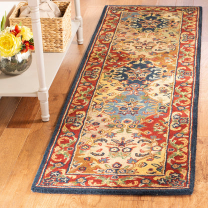 Tapis oriental traditionnel en laine SAFAVIEH fait main, motif reptiles.