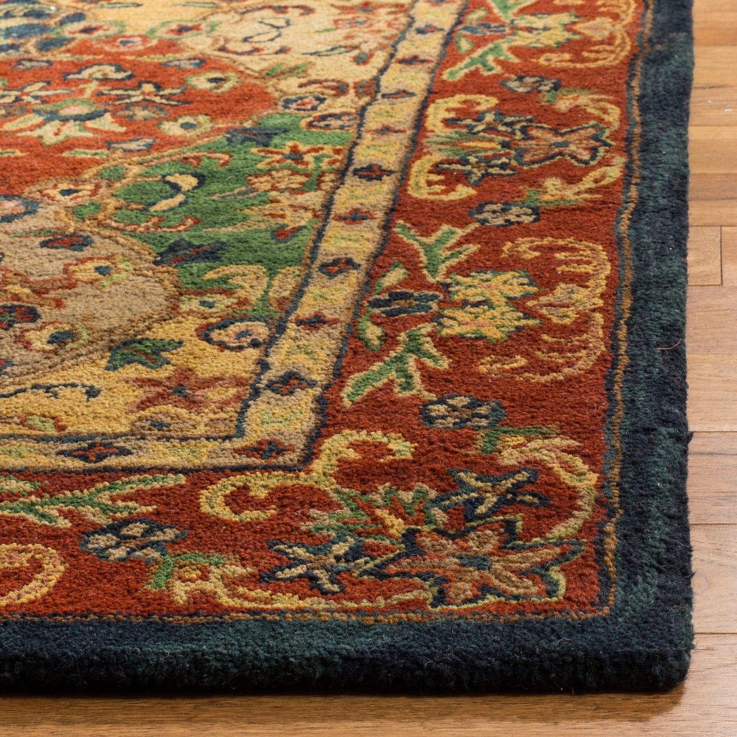 Tapis oriental traditionnel en laine SAFAVIEH fait main, motif reptiles.
