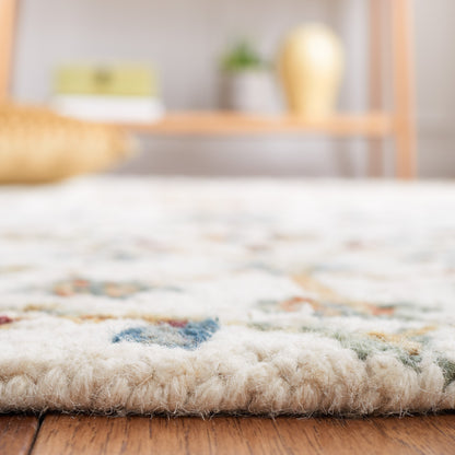 Tapis en laine à motif floral Snjolaug fait main SAFAVIEH Heritage