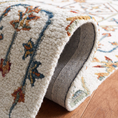 Tapis en laine à motif floral Snjolaug fait main SAFAVIEH Heritage
