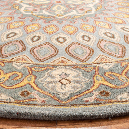 Tapis oriental traditionnel en laine SAFAVIEH fait main, modèle Heritage Wayfarer