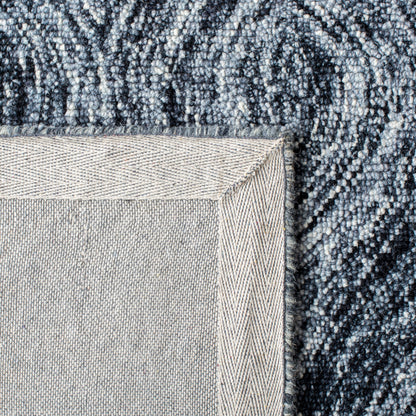 SAFAVIEH Tapis en laine Ikat Lilija fait main