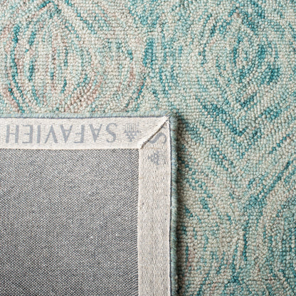 SAFAVIEH Tapis en laine Ikat Lilija fait main