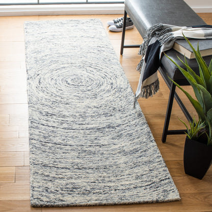 Tapis Maddison en laine ikat fait main SAFAVIEH