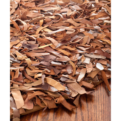 Tapis décoratif moderne SAFAVIEH en cuir shaggy fait main Doinita