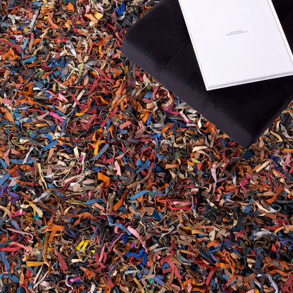 Tapis décoratif moderne SAFAVIEH en cuir shaggy fait main Doinita