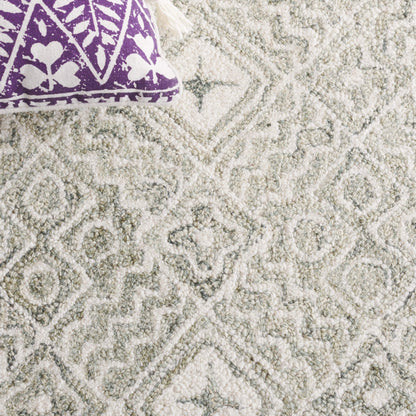 Tapis SAFAVIEH en laine Lutetia micro-bouclée faite à la main