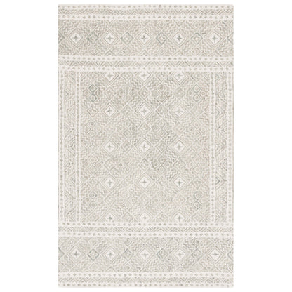 Tapis SAFAVIEH en laine Lutetia micro-bouclée faite à la main