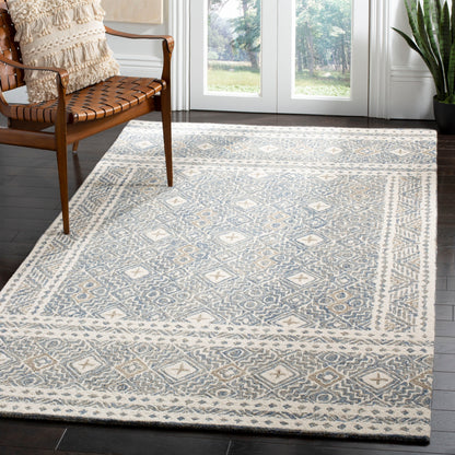 Tapis SAFAVIEH en laine Lutetia micro-bouclée faite à la main
