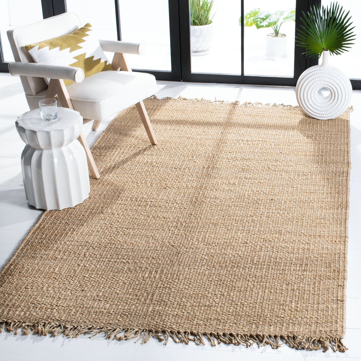 Tapis à franges en jute Eybjorg en fibres naturelles fait main SAFAVIEH