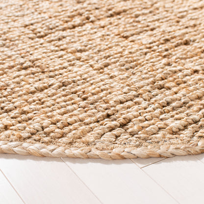 Tapis SAFAVIEH Nihada décontracté en fibre naturelle faite à la main, en jute unie.