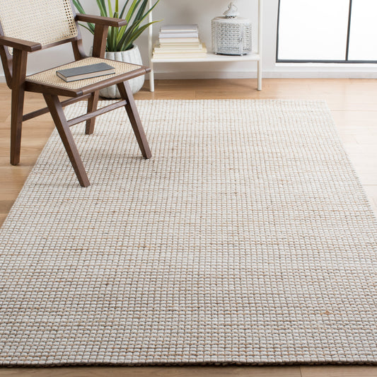 Tapis SAFAVIEH fait main en fibres naturelles Yareli, jute et laine.