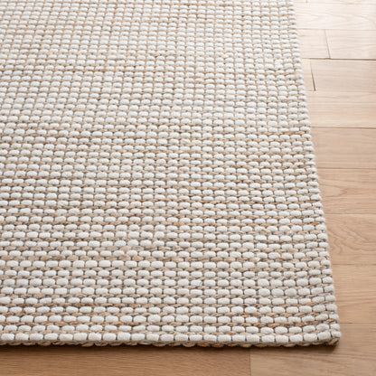 Tapis SAFAVIEH fait main en fibres naturelles Yareli, jute et laine.