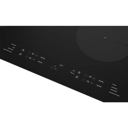 Table de cuisson à induction Whirlpool 30 à 4 éléments - Noir - WCI55US0JB | Surface de cuisson à induction Whirlpool de 31 po à 4 éléments - noire - WCI55US0JB