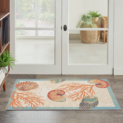 Tapis d'intérieur/extérieur Waverly Sun &amp; Shade Shore Thing Tropical Sea Shell Floral