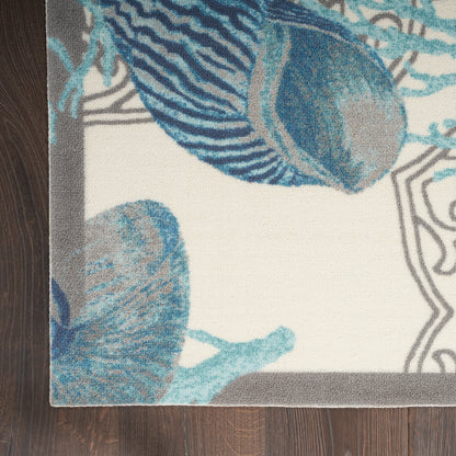 Tapis d'intérieur/extérieur Waverly Sun &amp; Shade Shore Thing Tropical Sea Shell Floral