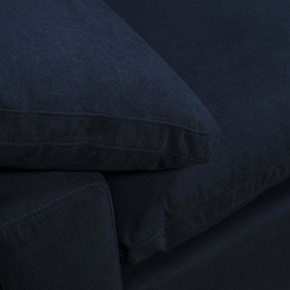 Sofa sectionnel modulaire Eclipse 5 pièces en tissu d’apparence lin avec pouf et coussins réversibles en duvet et plumes - bleu marine