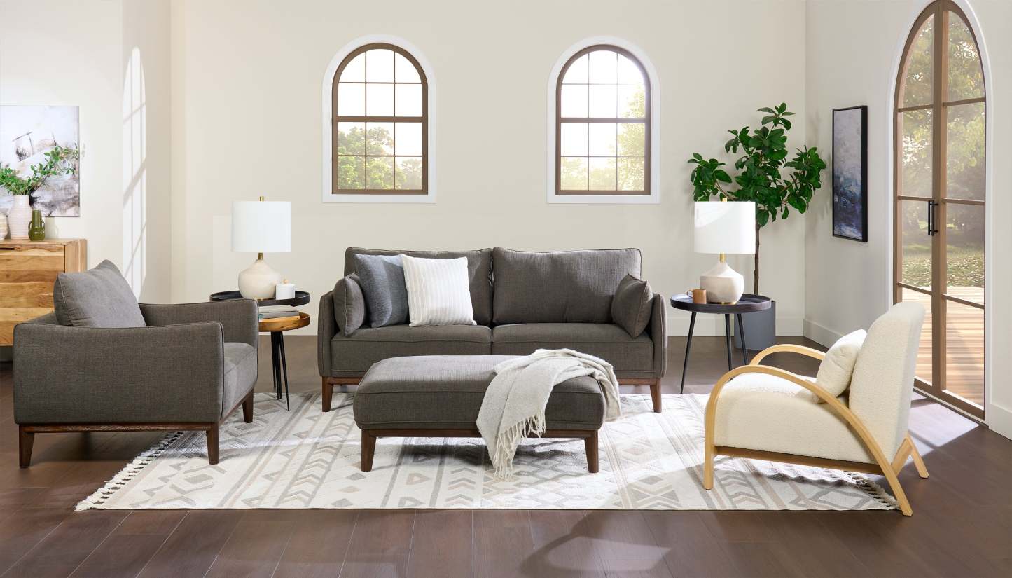 Cindy Crawford Home Pouf Gena 45 en tissu d'apparence lin avec base et pieds en bois - Gris anthracite | Pouf Gena de Cindy Crawford Home de 45 po en tissu d'apparence lin avec base et pattes en bois - gris anthracite