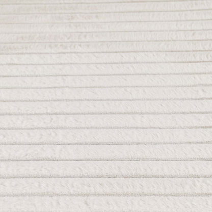 Tapis ivoire en fausse fourrure avec envers en mousse à mémoire de forme – 5' x 7' | Tapis Channel en fausse fourrure ivoire avec dos en mousse à mémoire de forme - 5 pi x 7 pi