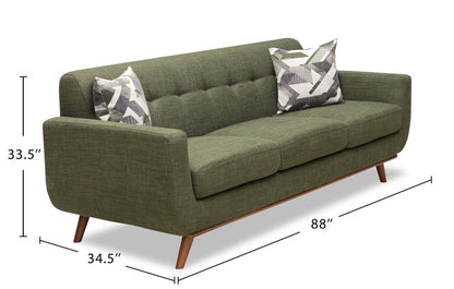 Sofa en tissu d’apparence lin Freeman 88 de Kort & Co. avec base en bois et coussins de dossier capitonnés - vert avocat