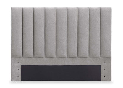 Lit de rangement Amos rembourré en tissu gris avec tête de lit à canaux et 3 tiroirs intégrés - format grand lit