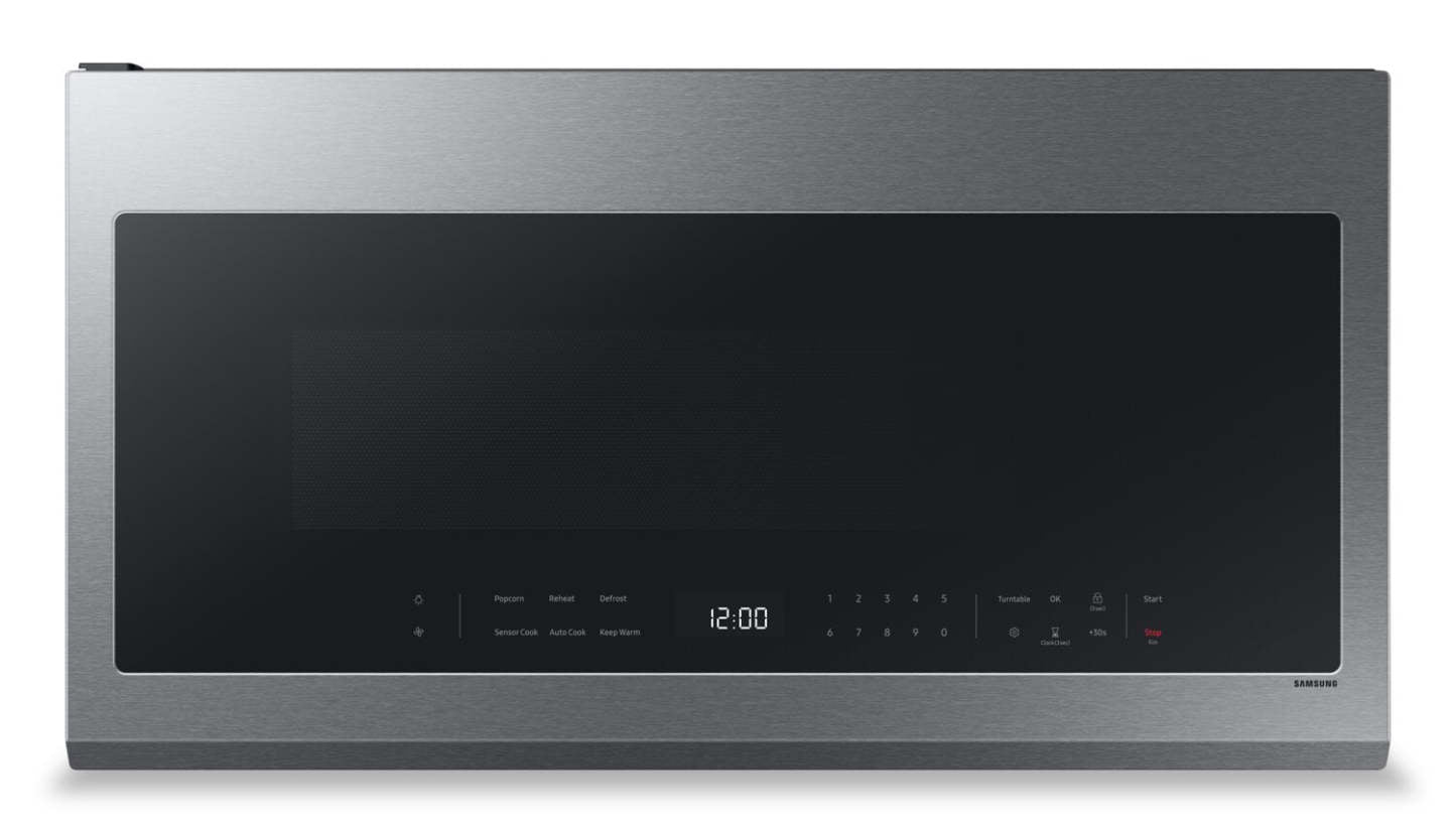 Samsung 2,1 Cu. Fort. Micro-ondes à hotte intégrée avec 400 CFM et affichage LED - Acier inoxydable - ME21DG… | Quatre à micro-ondes à hotte intégrée Samsung de 2,1 pi³ avec 400 pi³/min et affichage à DEL - acier i…